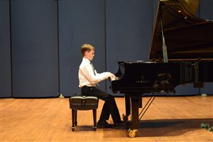 Luke performing at State Conference 2019 as a winner